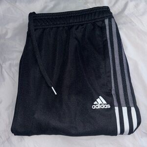 perfect fit with these stylish Adidas Track Pants. Brand new never worn